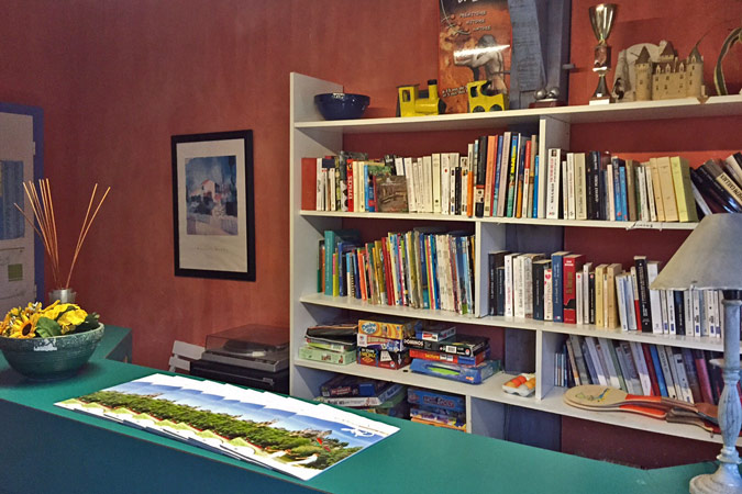 Library corner at  Hameau du Sentier des Sources, Sarlat